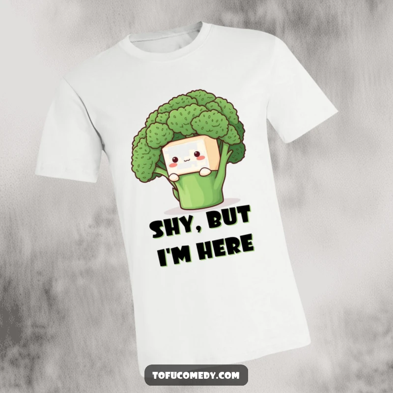 Funny T-Shirt: A shy anthropomorphic tofu cube peeking mischievously from behind a large, vibrant broccoli floret.